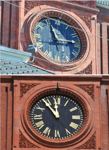 One of the four clock-faces, before (top) and after (bottom) rehabilitation.